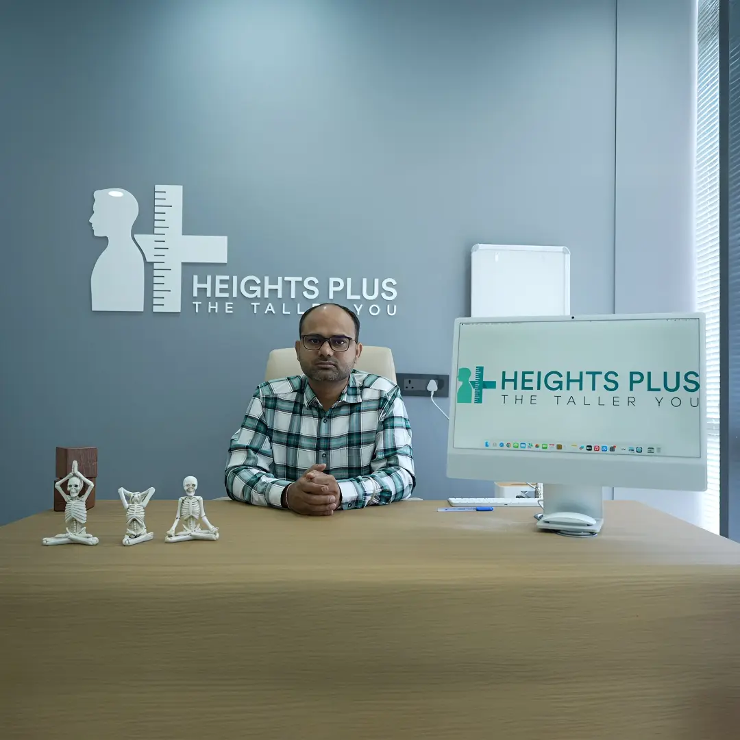Dr. Navish Kumar Vinod sitting on a chair